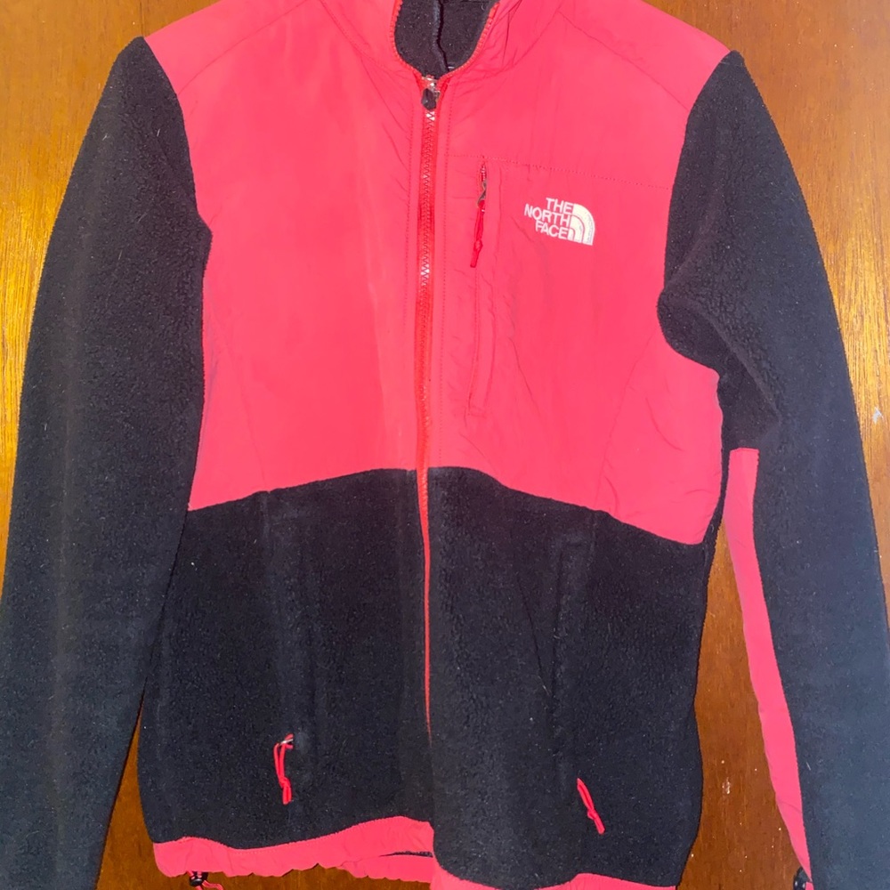 pink and black north face jacket